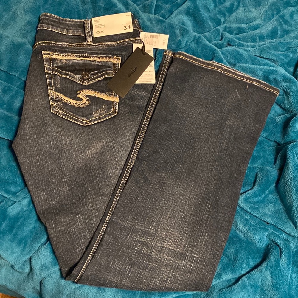 Dark wash silver jeans